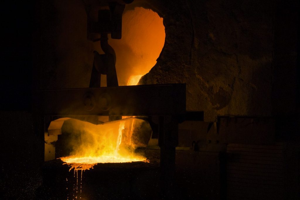 Molten steel glowing in a furnace mouth