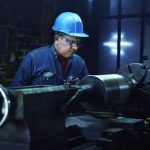 Machinist at a lathe