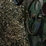 Metal shavings beside machinery